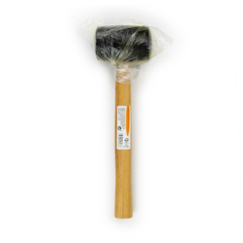 A rubber mallet with a wooden handle is wrapped in clear plastic, placed against a plain white background. Text on the handle re