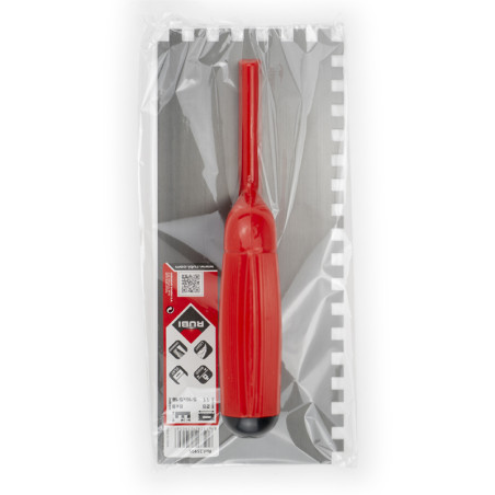 Un outil à manche rouge est emballé sur une feuille de plastique crantée grise et blanche. Le texte se lit comme suit : `Rubi,` 