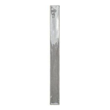 A glossy, narrow rectangular tile with a reflective surface rests vertically on a plain white background.