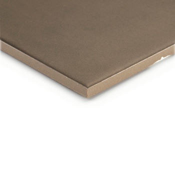 A square, smooth, brown tile with a slightly beveled edge rests against a white background, highlighting its thickness and textu