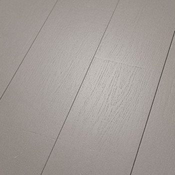 Gray wood-like tiles lie flat, showcasing subtle grain patterns, creating a smooth, modern surface in an interior flooring conte