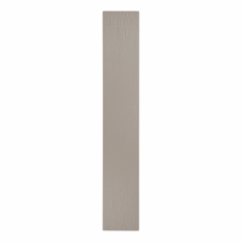 Un carreau de céramique rectangulaire gris clair se dresse verticalement, affichant une surface lisse et légèrement texturée, su