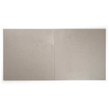 A smooth, large square tile reflects light subtly, featuring a pale, textured surface with faint, intricate patterns that blend 