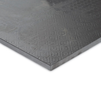 Fliese mit mattem Finish weist ein erhabenes geometrisches Muster aus kleinen Quadraten und Linien auf, die auf einer glatten Ec