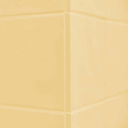 Los azulejos de cerámica amarillos forman una esquina en ángulo recto, creando una superficie elegante y minimalista con una ilu