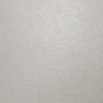 La superficie presenta una textura suave y blanca mate que se asemeja a Un azulejo cerámico, iluminada uniformemente, enfatizand