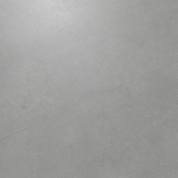 Les carreaux gris présentent une texture lisse et mate avec des variations subtiles, couvrant uniformément une surface plane. Il