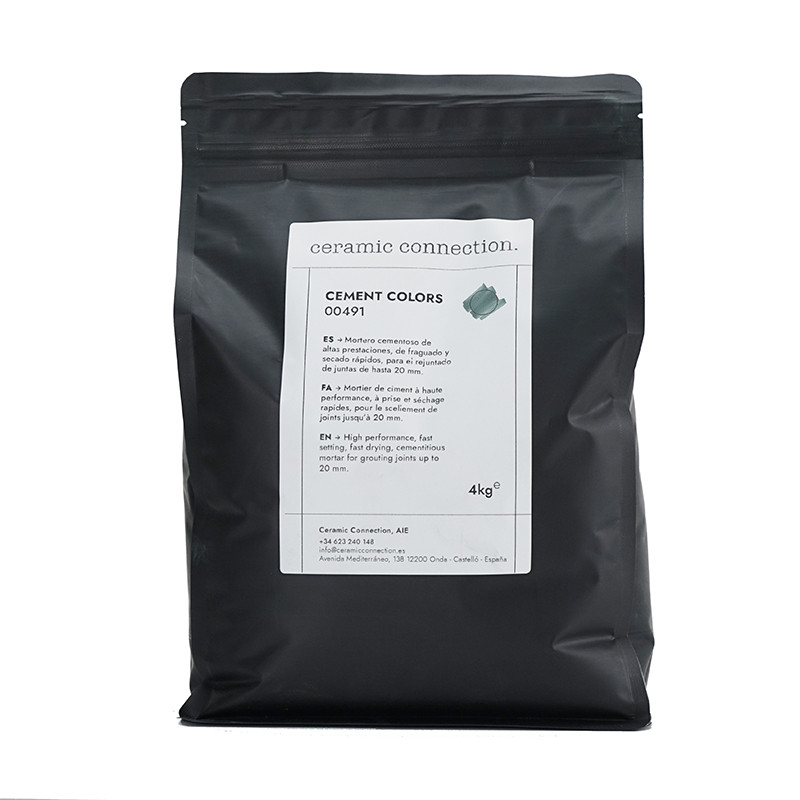 A black pouch labeled `ceramic connection` contains 4 kg of resin cement with usage instructions in Spanish below the brand name