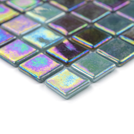 Square glass tiles reflect iridescent colors, arranged neatly in a grid pattern, creating a shimmering surface.
