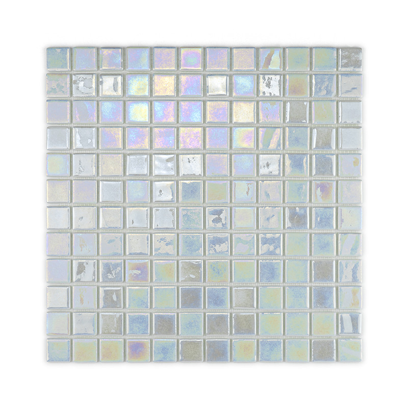Square glass tiles shimmer with iridescent hues, creating a reflective, colorful pattern within a grid layout.