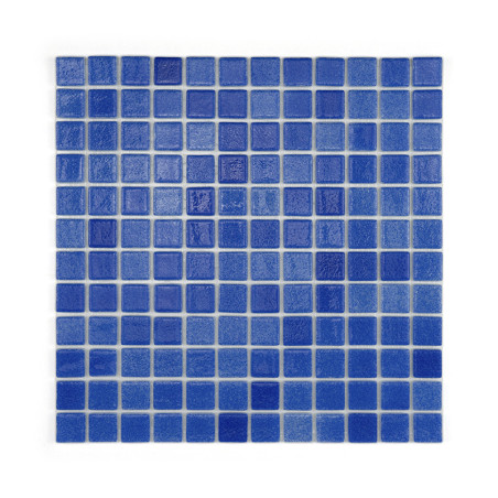 Square blue glass tiles arranged uniformly, forming a patterned grid, reflecting light in a simple, textured layout.