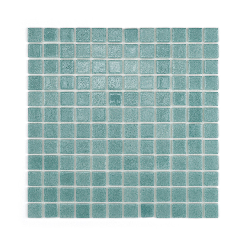 Turquoise glass tiles form a checkered pattern, reflecting light subtly, arranged neatly in a square mosaic layout.