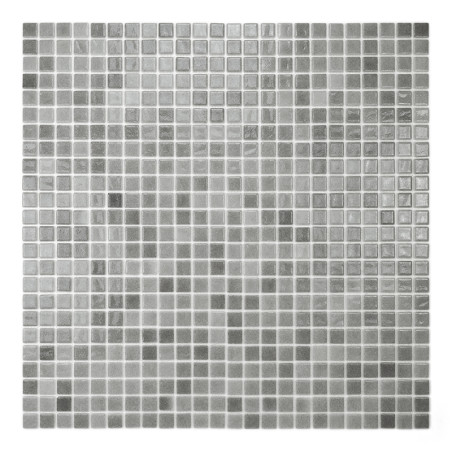 Los mosaicos de vidrio gris forman un patrón de cuadrícula que refleja la luz y crea una estética elegante y moderna en una supe