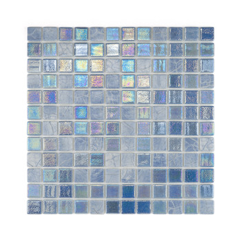 Iridescent glass tiles shimmer, arranged in a tightly gridded square, reflecting varied lights in muted blue tones.