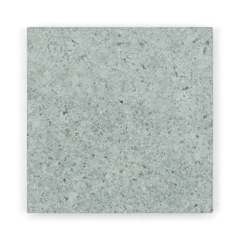 Gray stone tile, sitting flat, displaying a textured, speckled pattern with subtle variations in shade and color.