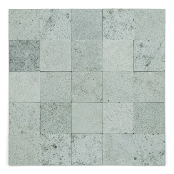 Gray stone tiles form a grid pattern, exhibiting speckles and slight color variation, creating a textured mosaic effect.