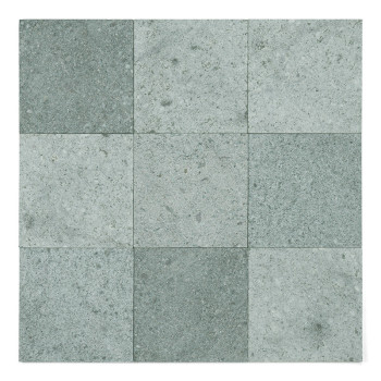 Nine square green stone tiles aligned in a 3x3 grid, displaying subtle variations in texture and shade.