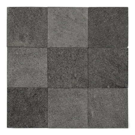 Nine dark gray stone tiles arranged in a square grid, creating a uniform and textured surface.