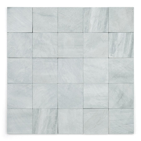 Square stone tiles arranged in a grid, displaying a smooth, subtle marbled pattern in light gray shades.