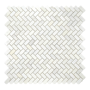 White rectangular marble tiles are arranged in a herringbone pattern, forming an interlocking geometric design on a flat surface