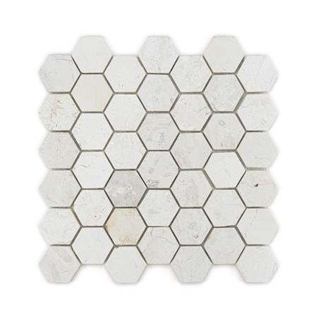 Hexagonal stone tiles arranged in a grid, displaying a mix of light beige and gray tones, creating a textured pattern.