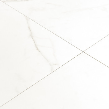 Los azulejos de mármol blanco presentan tenues vetas grises, formando un patrón de cuadrícula clásico. descansa sobre una superf