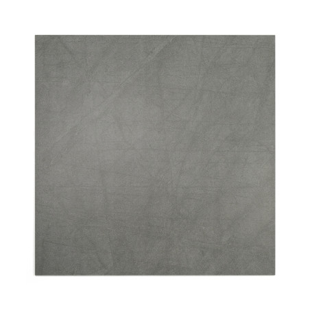 Un azulejo cuadrado presenta una superficie gris lisa y moteada, lo que sugiere una textura de piedra u hormigón. El fondo es co