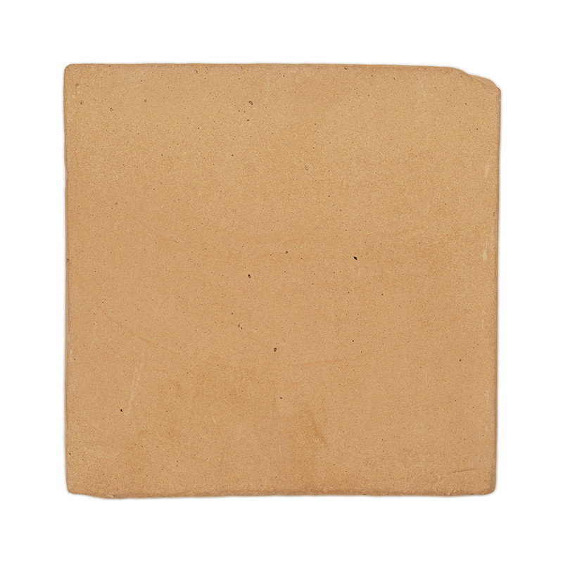 Azulejos cuadradas de terracota, planas, rodeadas por un fondo blanco liso.