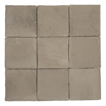 Square terracotta tile resting flat, displaying its earthy, grayish tone, with subtle texture and no distinct markings.