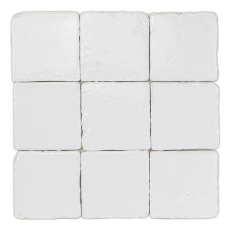 White terracotta tiles arranged in a three-by-three grid, featuring a glossy surface and subtle texture.