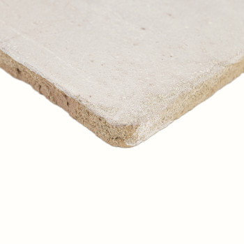 A rough, light beige terracotta tile sits angled, revealing a textured, matte surface and slightly uneven edges.