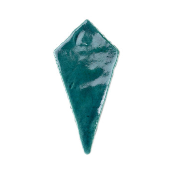 A glossy, teal, kite-shaped terracotta tile lies flat against a plain white background.