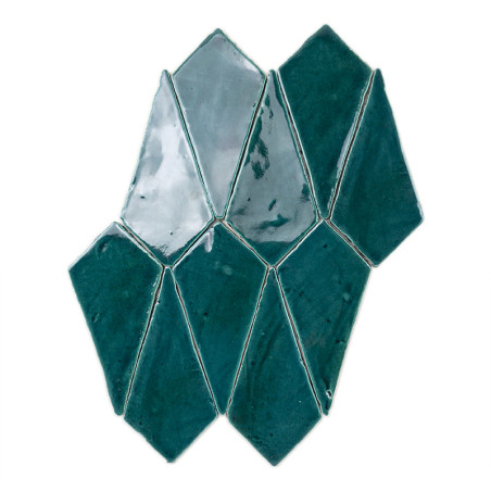 Teal-green ceramic tiles arranged in a geometric pattern, reflecting light, against a plain white background.
