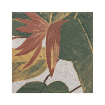 Un azulejo decorativo muestra una flor estilizada de color naranja y amarillo con pétalos puntiagudos que se superponen a exuber